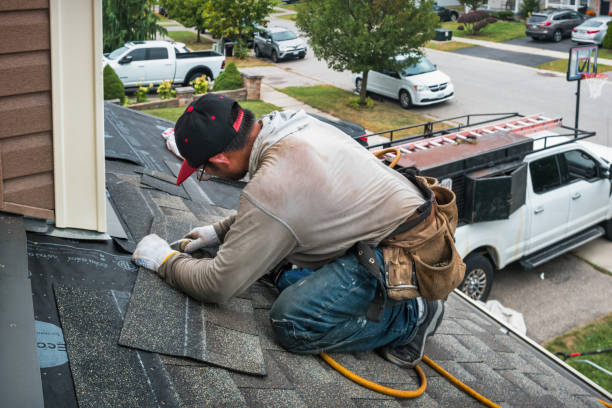 Professional Roofing technician working in Vergennes, VT